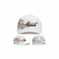 Alamòd Archives Orijin trucker hat with mesh back and embroidered front panel in a stylish, casual design.
