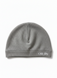 Alamòd Archives Orijin Grey Skull Cap, stylish grey knit cap with skull design, worn on the back.