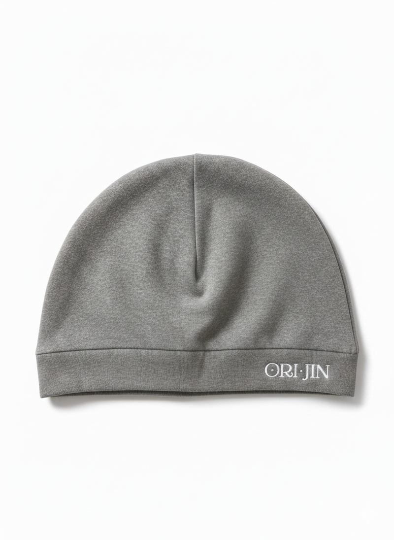 Alamòd Archives Orijin Grey Skull Cap, stylish grey knit cap with skull design, worn on the back.