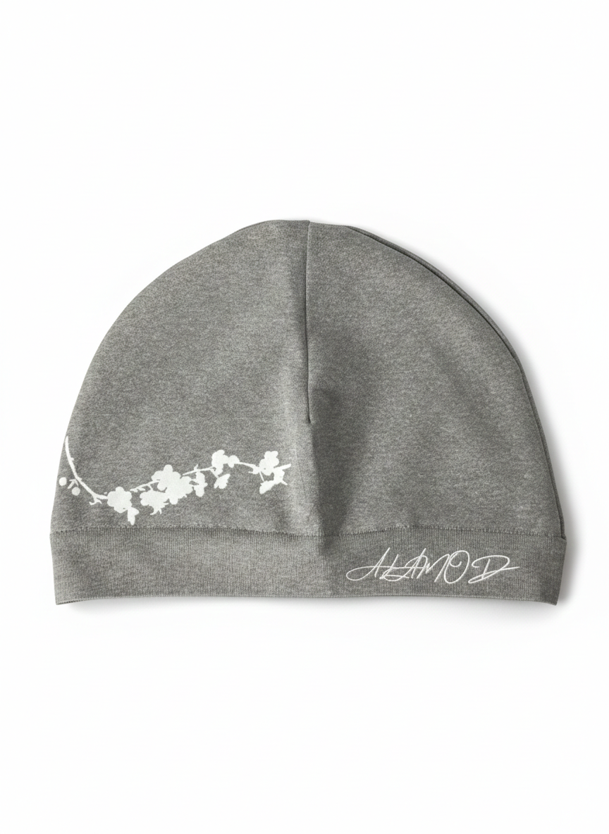 Front view of Alamòd Archives Orijin Grey Skull Cap featuring a stylish grey skull design.