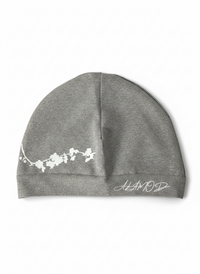 Front view of Alamòd Archives Orijin Grey Skull Cap featuring a stylish grey skull design.