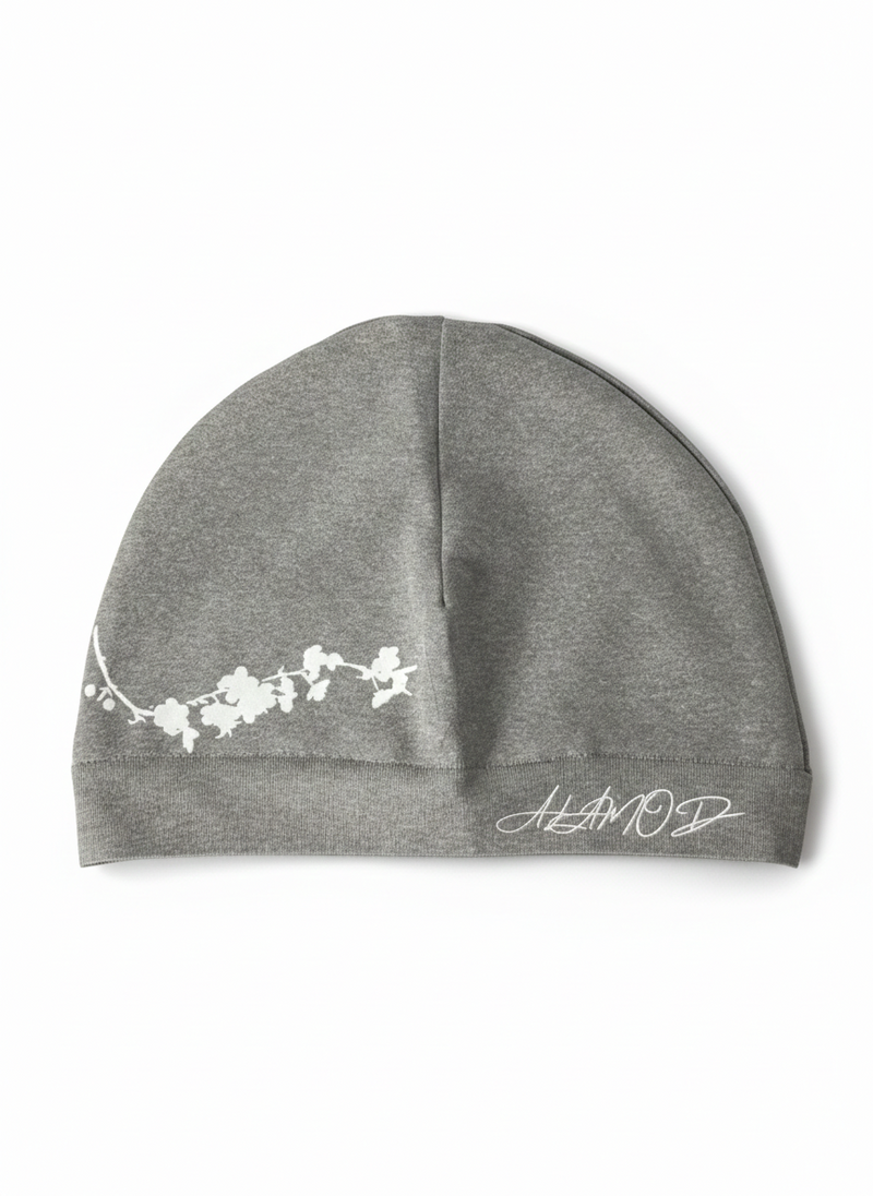 Front view of Alamòd Archives Orijin Grey Skull Cap featuring a stylish grey skull design.